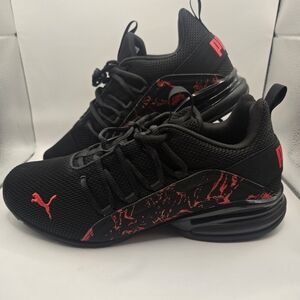 Puma Axelion City Escape shoe in the black and high-risk red. Mens 11 1/2